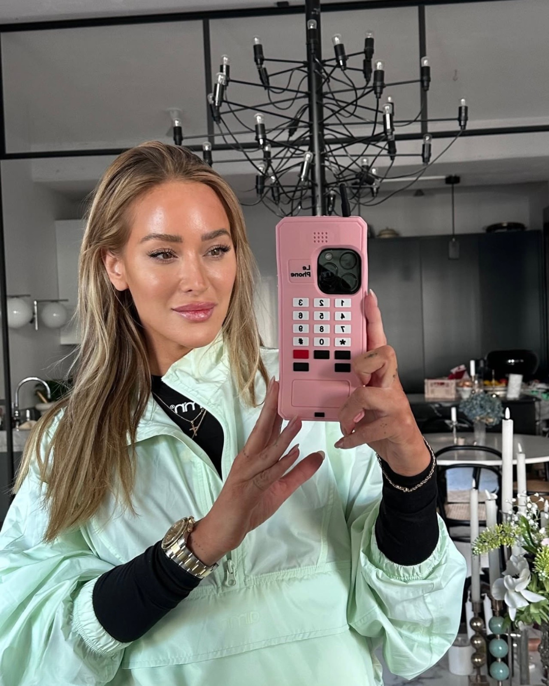 Mint jacket mirror selfie with Le Phone case